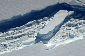 <p>Ice melange, a combination of ice shelf fragments, windblown snow and frozen seawater, can act as a glue to fuse large rifts in floating ice in Antarctica. Researchers at UCI and NASA JPL found that a thinning of the substance over time can cause rifts to open, leading to the calving of large icebergs.  Beck / NASA Operation IceBridge</p>
