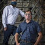 <p>Study authors Curtis D. Hodge (left) and Michael Hammel are photographed near the entrance to Lawrence Berkeley National Laboratory where they used small angle X-ray scattering to study SARS-CoV-2 antibodies. (Credit: Thor Swift/Berkeley Lab)</p>

