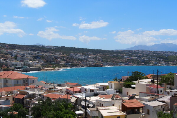 Photograph of Cretian landscape overlooking a body of water.