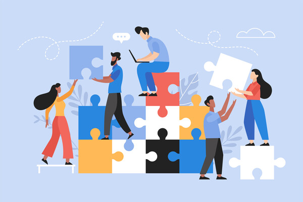 People work together to solve a puzzle