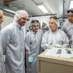 <p>Several researchers in Berkeley Lab’s ATAP Division look over the beam profile captured on radiochromic film at the BELLA Center. From left, they are Lieselotte Obst-Huebl, Axel Huebl, Sahel Hakimi, SULI intern Anya Jewell, and Kei Nakamura. (Credit: Marilyn Sargent/Berkeley Lab)</p>
