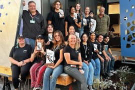 <p>UCI’s TeamMADE took home trophies signifying their second-place overall finish in the Orange County Sustainability Decathlon. The team had a strong showing in several categories including engineering &#038; construction, market potential, sustainability &#038; resilience, architecture &#038; interior design, communications &#038; marketing and innovation. Natalie Tso / UCI</p>
