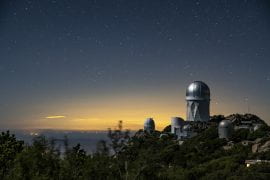 <p>The Dark Energy Spectroscopic Instrument sits atop the Mayall 4-Meter Telescope at Kitt Peak National Observatory in Tucson, Arizona. DESI’s early data gathered in 2020 and 2021 is now publicly available. Marilyn Sargent / Berkeley Lab</p>
