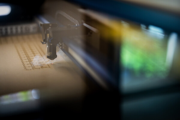 close up image of the laser cutter at the biotech commons