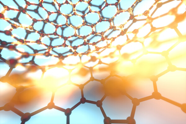 Microscopic view of cells illuminated by light.