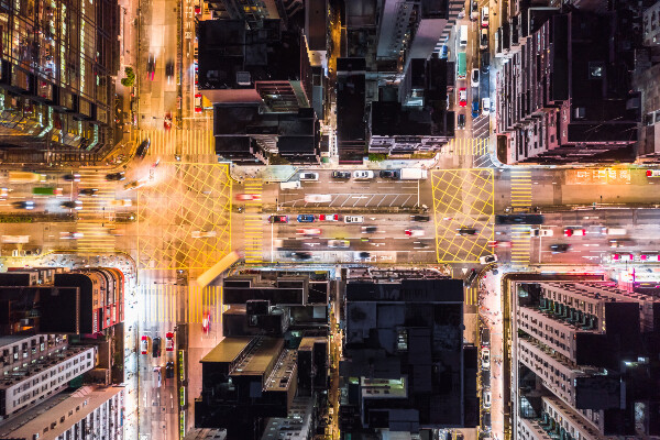 an aerial view of city streets at night