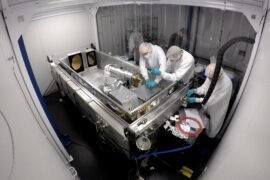 <p>Team members install components on the Habitable-Zone Planet Finder, a spectroscopic instrument attached to the Hobby-Eberly Telescope at McDonald Observatory in Texas. The HPF was designed discover exoplanets orbiting dim M dwarf stars, which are plentiful in the Milky Way galaxy, but in a recent project, it was used to dispute the existence of a planet in the Barnard’s star system. Guðmundur Stefánsson / Pennsylvania State University</p>
