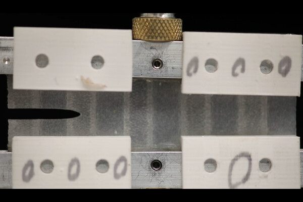 Glass fibers embedded in stretchy silicone.