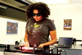 <p>Desiré Whitmore’s obsession with quantum mechanics drew her to the labs of two of her UCI chemistry professors – Eric Potma and Ara Apkarian. Steve Zylius / UCI</p>
